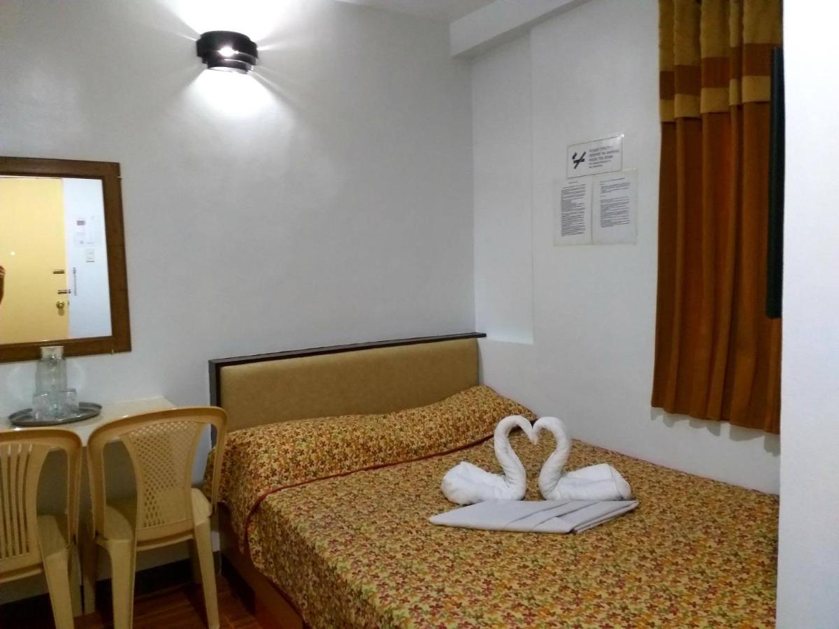 Sola Eleganza Apartelle Bandar Quezon Luaran gambar